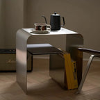 La table d'appoint Arc — Acier brossé